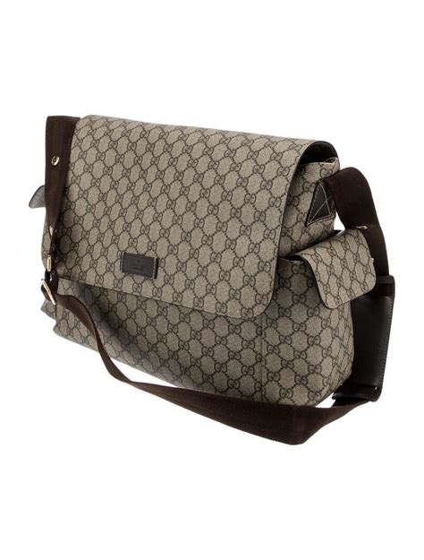 gucci gg supreme wolf-print diaper bag brown|pre owned gucci diaper bag.